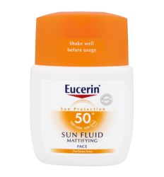 Eucerin SUN fluid SPF50+ Mattifying za lice 50ml za zaštitu normalne i kombinovane kože lica od UVA, UVB zraka i HEVIS. Lako se upija i matira ten.